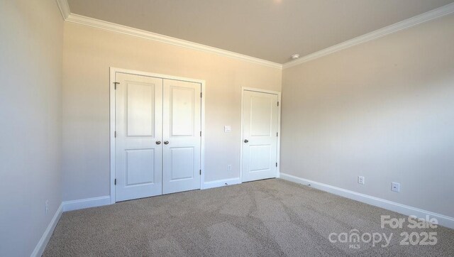 122 Sugg Trl, Weaverville, NC 28787 - unfurnished bedroom with ornamental molding, carpet, and a closet