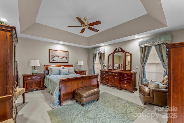 1236 James Farm Rd, Hickory, NC 28602 - bedroom with a tray ceiling, light carpet, a ceiling fan, and recessed lighting