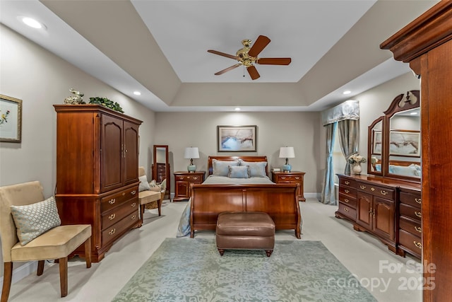 1236 James Farm Rd, Hickory, NC 28602 - bedroom with recessed lighting, a tray ceiling, a ceiling fan, and light colored carpet