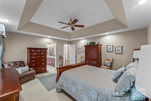 1236 James Farm Rd, Hickory, NC 28602 - bedroom featuring a raised ceiling, light carpet, ceiling fan, connected bathroom, and recessed lighting