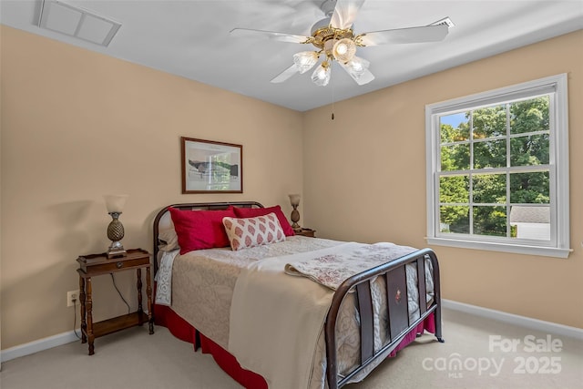 1236 James Farm Rd, Hickory, NC 28602 - carpeted bedroom with baseboards and a ceiling fan