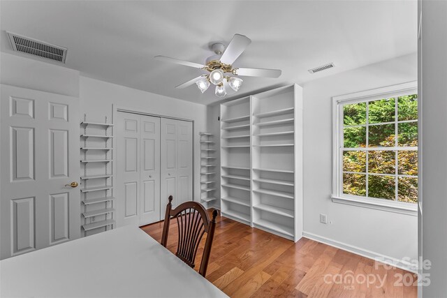 1236 James Farm Rd, Hickory, NC 28602 - unfurnished dining area featuring a ceiling fan and wood finished floors