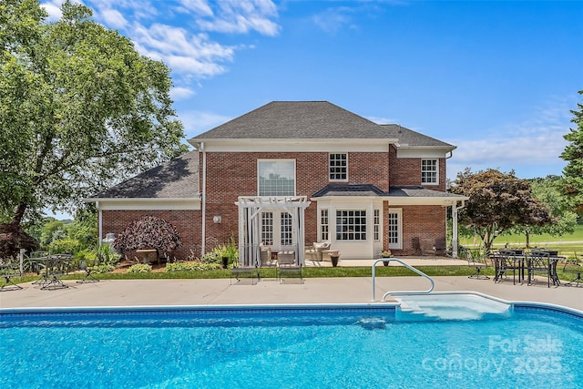1236 James Farm Rd, Hickory, NC 28602 - back of property featuring a pergola, a patio, brick siding, and an outdoor pool