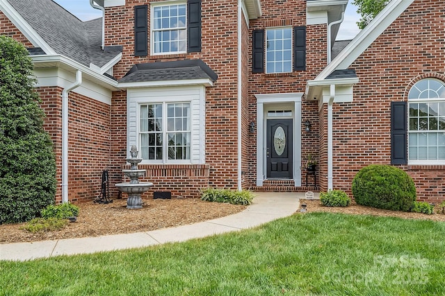 1236 James Farm Rd, Hickory, NC 28602 - view of exterior entry featuring brick siding and roof with shingles