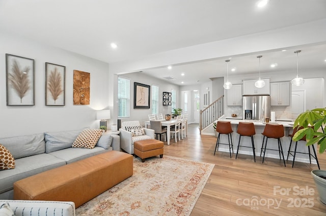 11246 Bartrams Way, Charlotte, NC 28278 - living area featuring recessed lighting, light wood-type flooring, and stairway