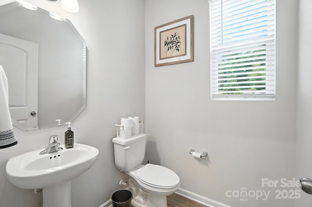 11246 Bartrams Way, Charlotte, NC 28278 - half bathroom featuring toilet and wood finished floors