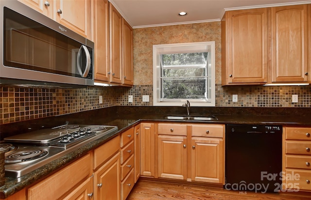 6117 Yellowood Rd, Charlotte, NC 28210 - kitchen with stainless steel appliances, crown molding, light wood-style floors, decorative backsplash, and dark stone countertops