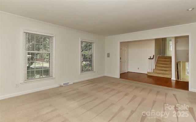6117 Yellowood Rd, Charlotte, NC 28210 - unfurnished room with carpet, ornamental molding, and stairway