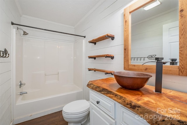 6811 Kluttz Rd, Concord, NC 28025 - full bath with crown molding, vanity, tub / shower combination, and wood finished floors