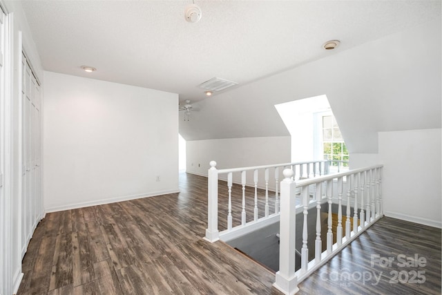 6811 Kluttz Rd, Concord, NC 28025 - bonus room featuring lofted ceiling, wood finished floors, and a ceiling fan
