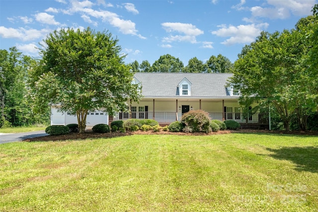 6811 Kluttz Rd, Concord, NC 28025 - cape cod home featuring covered porch, a front yard, and asphalt driveway