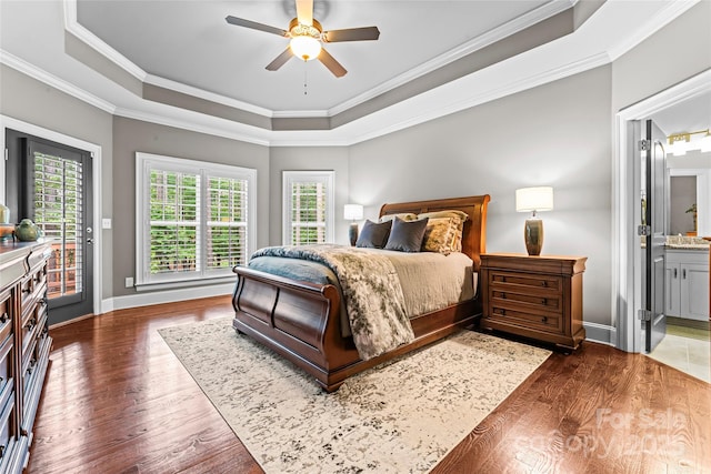 109 Trent Pines Dr, Mooresville, NC 28117 - bedroom with access to outside, a tray ceiling, multiple windows, crown molding, and wood finished floors