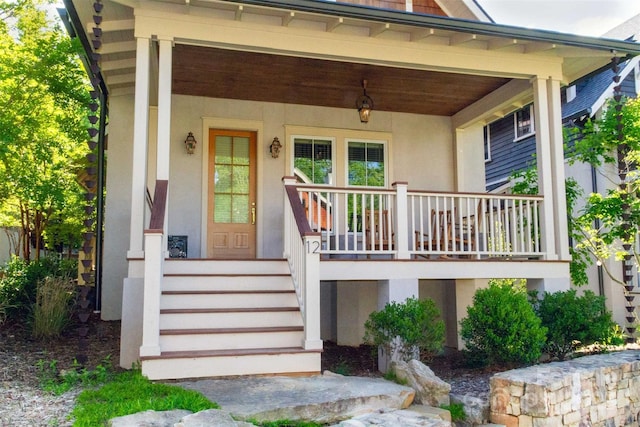 12 Fay Jones Ln, Black Mountain, NC 28711 - property entrance with a porch and stucco siding