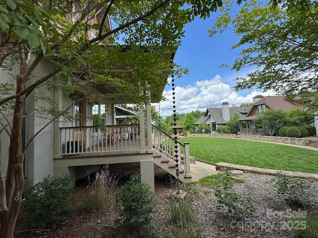 12 Fay Jones Ln, Black Mountain, NC 28711 - view of green lawn featuring a wooden deck and stairs