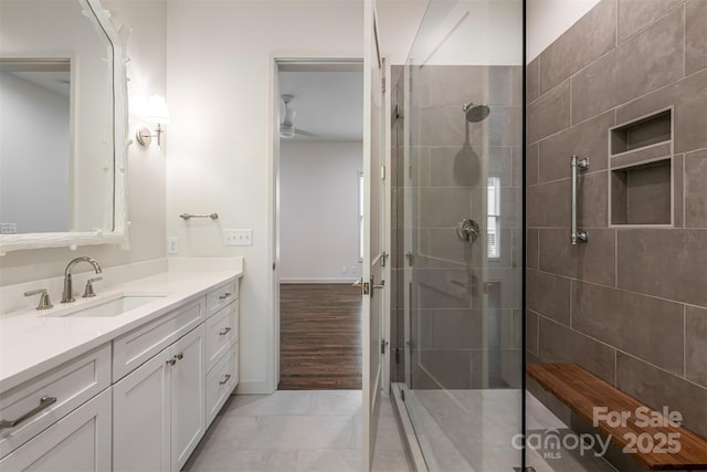 12 Fay Jones Ln, Black Mountain, NC 28711 - full bathroom featuring vanity, a tile shower, and a ceiling fan