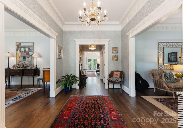 2324 Kingsmill Ter, Charlotte, NC 28270 - foyer with a chandelier, dark wood-style floors, and crown molding