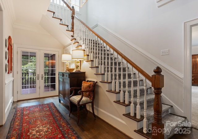 2324 Kingsmill Ter, Charlotte, NC 28270 - staircase featuring french doors, wood finished floors, and ornamental molding