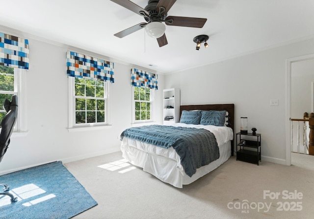2324 Kingsmill Ter, Charlotte, NC 28270 - carpeted bedroom with crown molding and a ceiling fan