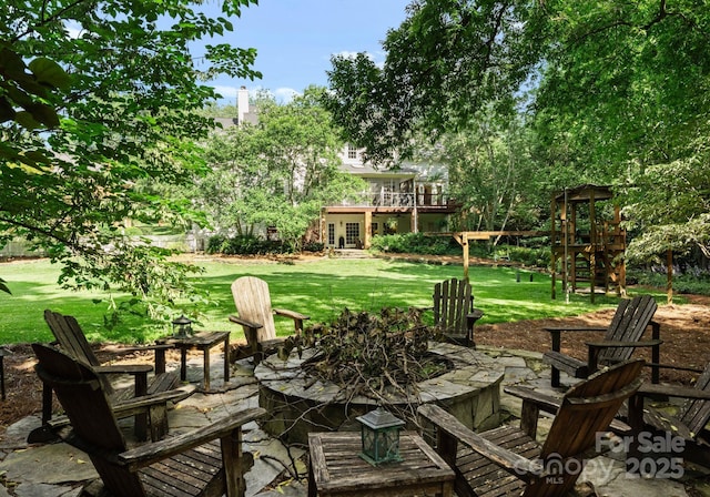 2324 Kingsmill Ter, Charlotte, NC 28270 - view of patio / terrace featuring a fire pit, a playground, and french doors