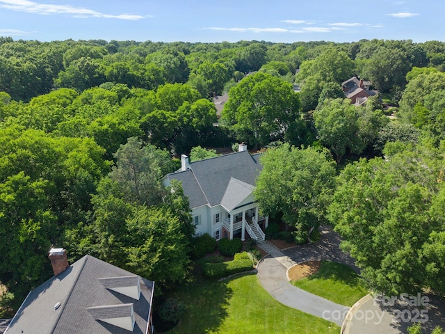2324 Kingsmill Ter, Charlotte, NC 28270 - aerial view of property and surrounding area featuring a heavily wooded area