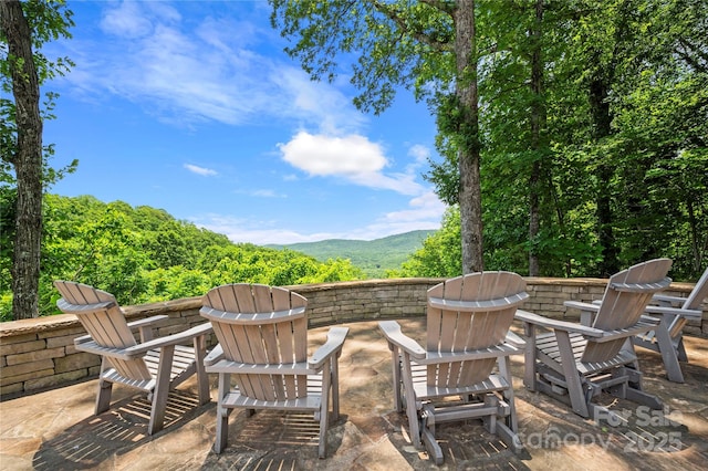2045 Hogback Mountain Rd, Tryon, NC 28782 - view of patio / terrace featuring a fire pit and a mountain view