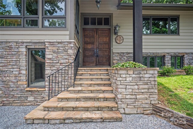 2045 Hogback Mountain Rd, Tryon, NC 28782 - doorway to property featuring stone siding