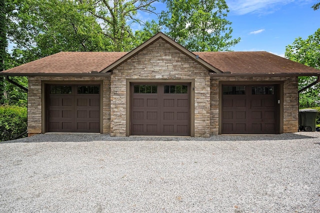 2045 Hogback Mountain Rd, Tryon, NC 28782 - view of front of house featuring a shingled roof, stone siding, and an outdoor structure