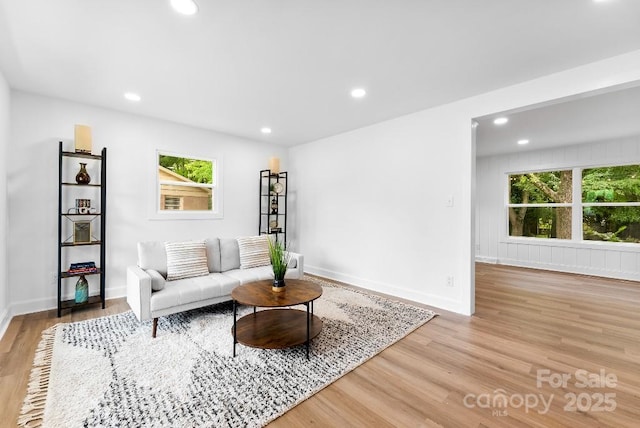 1426 Larkfield Ln, Charlotte, NC 28210 - living area with light wood-style floors, plenty of natural light, and recessed lighting
