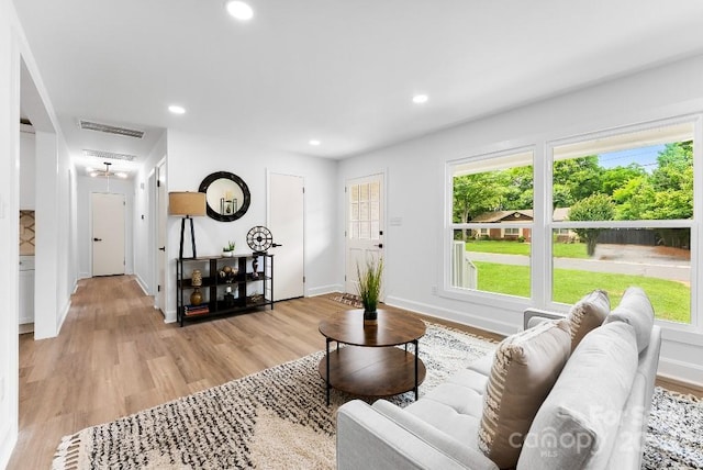1426 Larkfield Ln, Charlotte, NC 28210 - living area with healthy amount of natural light, light wood-type flooring, and recessed lighting