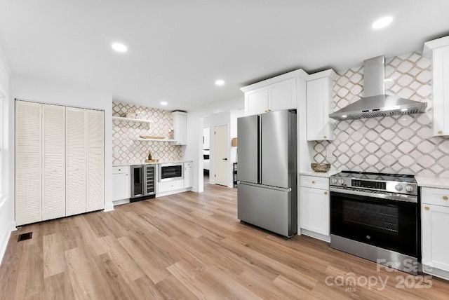 1426 Larkfield Ln, Charlotte, NC 28210 - kitchen with wall chimney exhaust hood, stainless steel appliances, tasteful backsplash, beverage cooler, and open shelves
