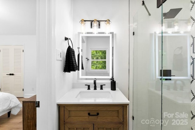 1426 Larkfield Ln, Charlotte, NC 28210 - full bathroom with a shower stall, vanity, and wood finished floors