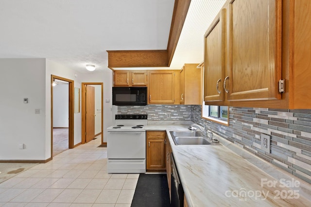 108 Deer Run Rd, Mills River, NC 28759 - kitchen featuring black appliances, tasteful backsplash, light countertops, and light tile patterned flooring