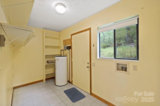 108 Deer Run Rd, Mills River, NC 28759 - washroom featuring water heater, hookup for a washing machine, a textured ceiling, and light tile patterned floors
