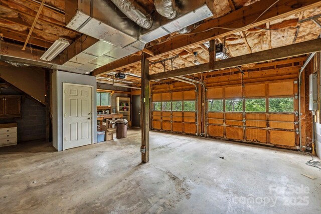 108 Deer Run Rd, Mills River, NC 28759 - garage featuring a garage door opener