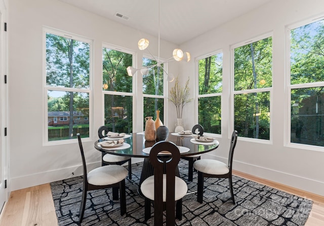 1622 Burtonwood Cir, Charlotte, NC 28212 - dining space with wood finished floors and healthy amount of natural light