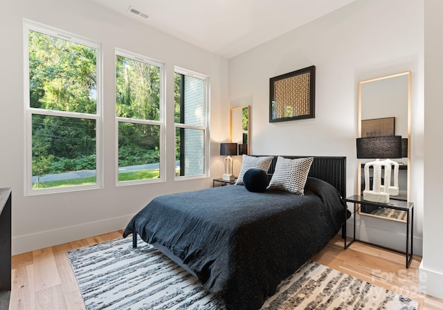 1622 Burtonwood Cir, Charlotte, NC 28212 - bedroom featuring wood finished floors and baseboards