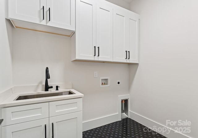 1622 Burtonwood Cir, Charlotte, NC 28212 - laundry area featuring hookup for an electric dryer, washer hookup, cabinet space, and dark tile patterned flooring