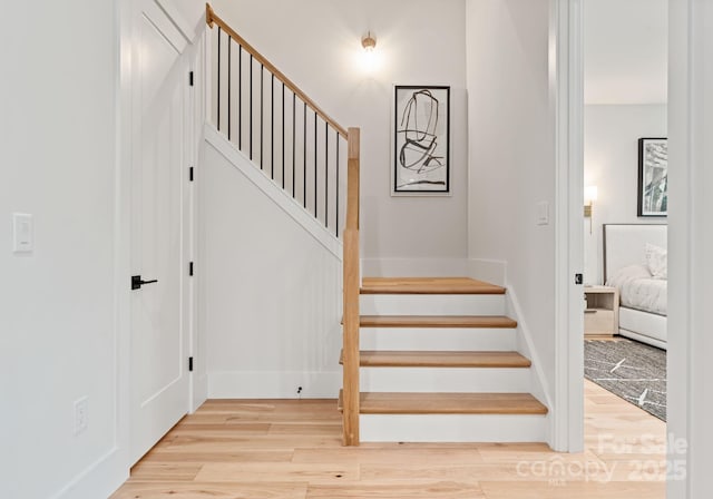 1622 Burtonwood Cir, Charlotte, NC 28212 - stairs with wood finished floors and baseboards