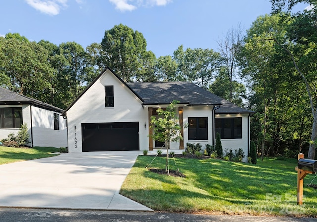 1622 Burtonwood Cir, Charlotte, NC 28212 - view of front of house with an attached garage, driveway, a front yard, and roof with shingles