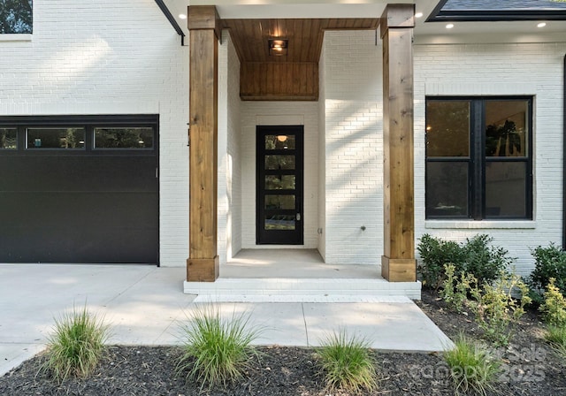 1622 Burtonwood Cir, Charlotte, NC 28212 - view of exterior entry featuring a porch and brick siding