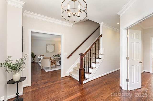 205 Rosedale Ln, Matthews, NC 28105 - stairway with a chandelier, wood finished floors, crown molding, and recessed lighting
