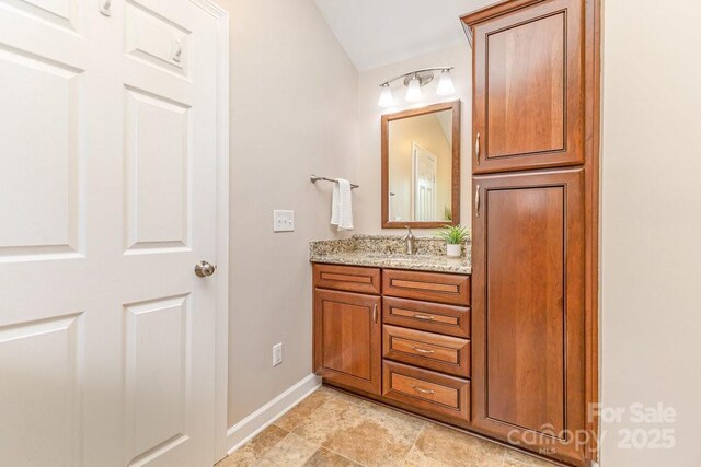 205 Rosedale Ln, Matthews, NC 28105 - bathroom featuring baseboards and vanity