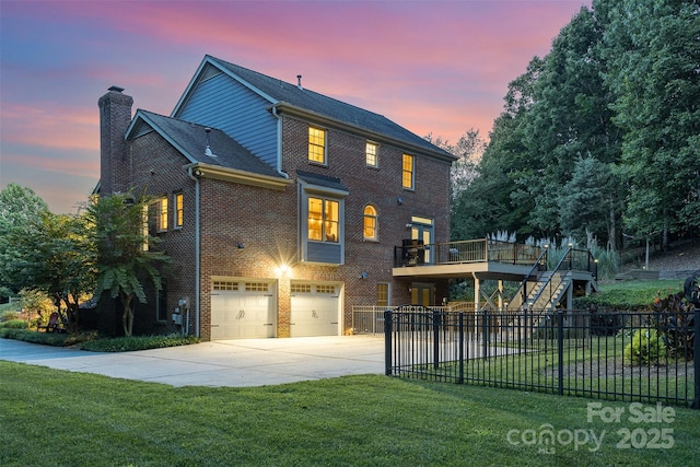 205 Rosedale Ln, Matthews, NC 28105 - view of front of home with brick siding, concrete driveway, a chimney, a garage, and stairway