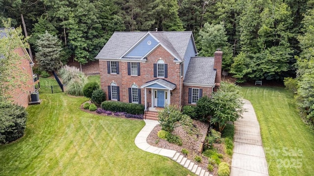 205 Rosedale Ln, Matthews, NC 28105 - view of front of house with brick siding and a chimney