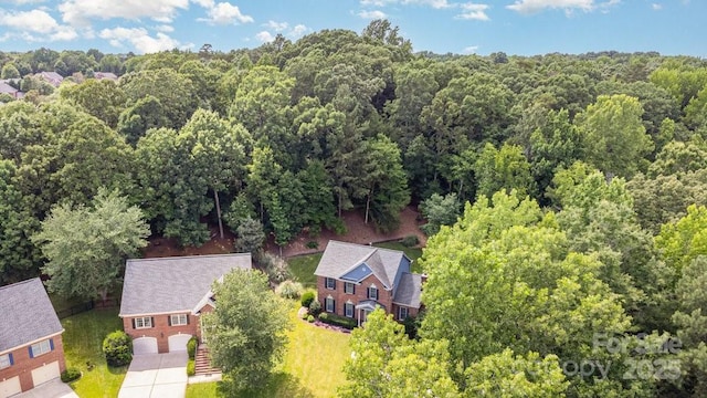 205 Rosedale Ln, Matthews, NC 28105 - aerial view of property and surrounding area featuring a forest