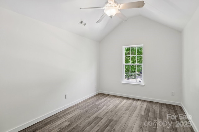 1986 Trace Creek Dr, Waxhaw, NC 28173 - unfurnished room featuring wood finished floors, ceiling fan, and vaulted ceiling