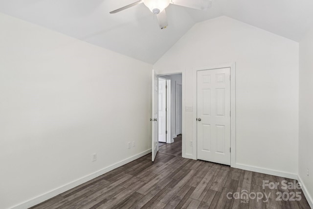 1986 Trace Creek Dr, Waxhaw, NC 28173 - unfurnished bedroom with wood finished floors, vaulted ceiling, and a ceiling fan