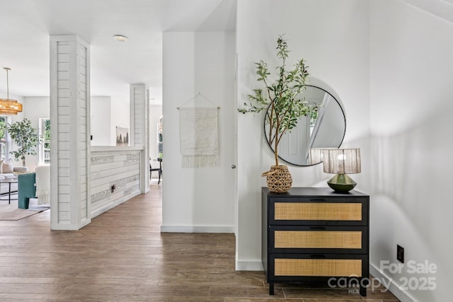 1986 Trace Creek Dr, Waxhaw, NC 28173 - corridor featuring hardwood / wood-style flooring and a chandelier