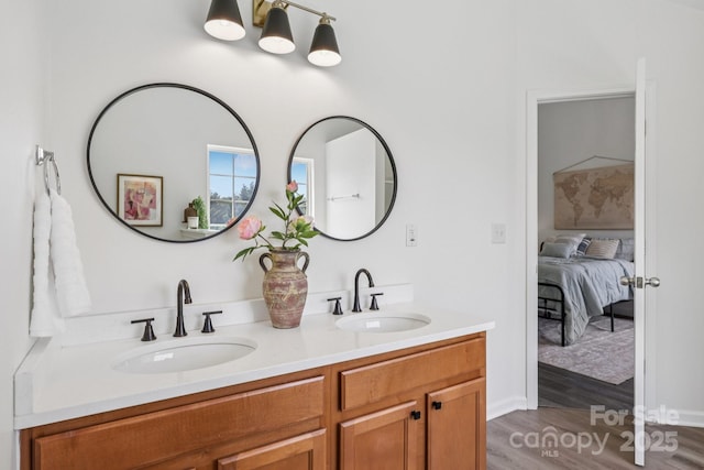 1986 Trace Creek Dr, Waxhaw, NC 28173 - ensuite bathroom with double vanity and wood finished floors