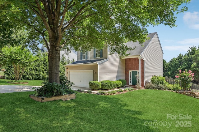 1986 Trace Creek Dr, Waxhaw, NC 28173 - view of front of house featuring an attached garage and brick siding